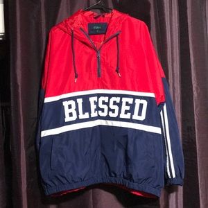 blue and red graphic wind breaker “blessed”